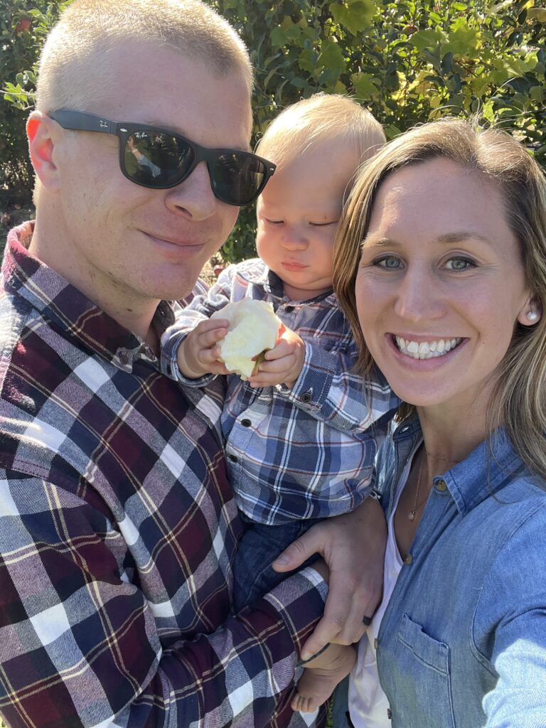 family picks apples together